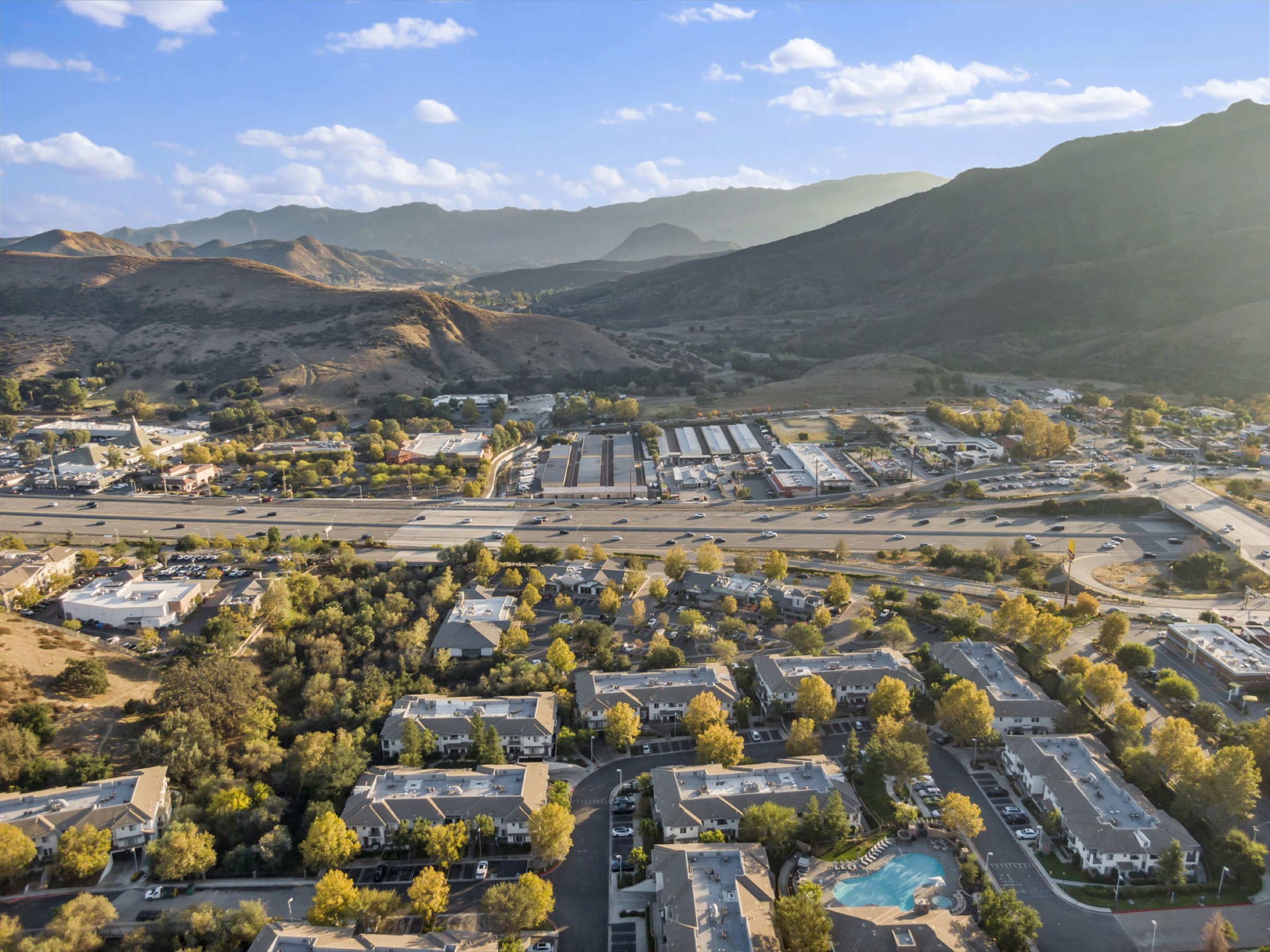 Aerial of the Agoura Road corridor showing Agoura Village Center, Whizin Market Square, Kanan Village and the 101 freeway